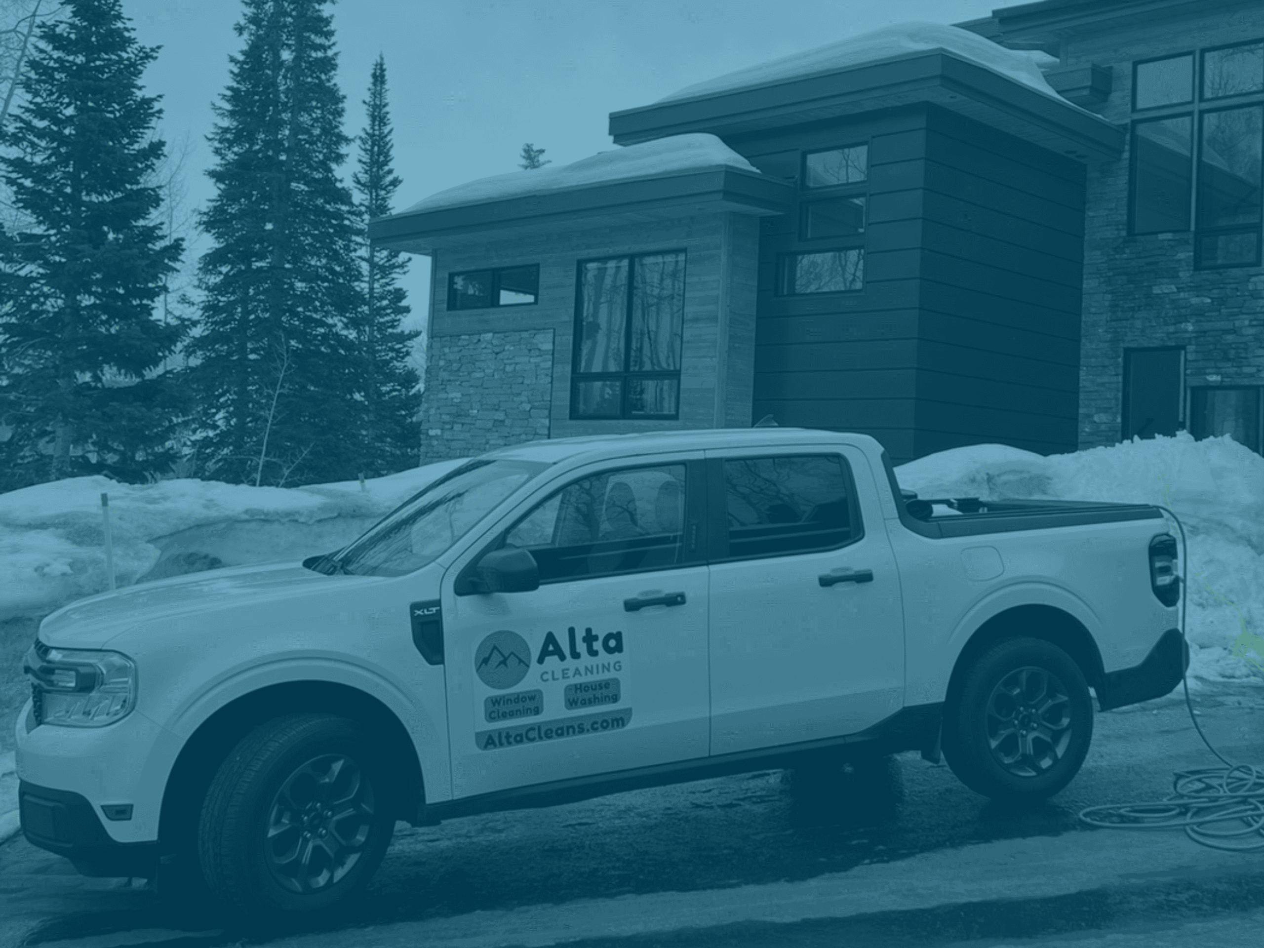 Alta Cleaning truck in front of Park City home